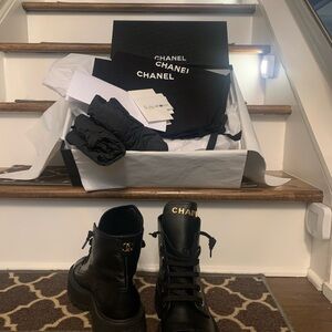 CHANEL Black Ankle Boots with Gold Details